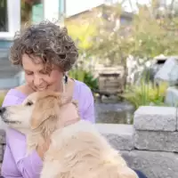 Dr Leslies and her golden retriever enjoying the outdoors.
